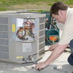 AC Repairman Welds Connector on Replacement Air Conditioner - AC Repair Spokane